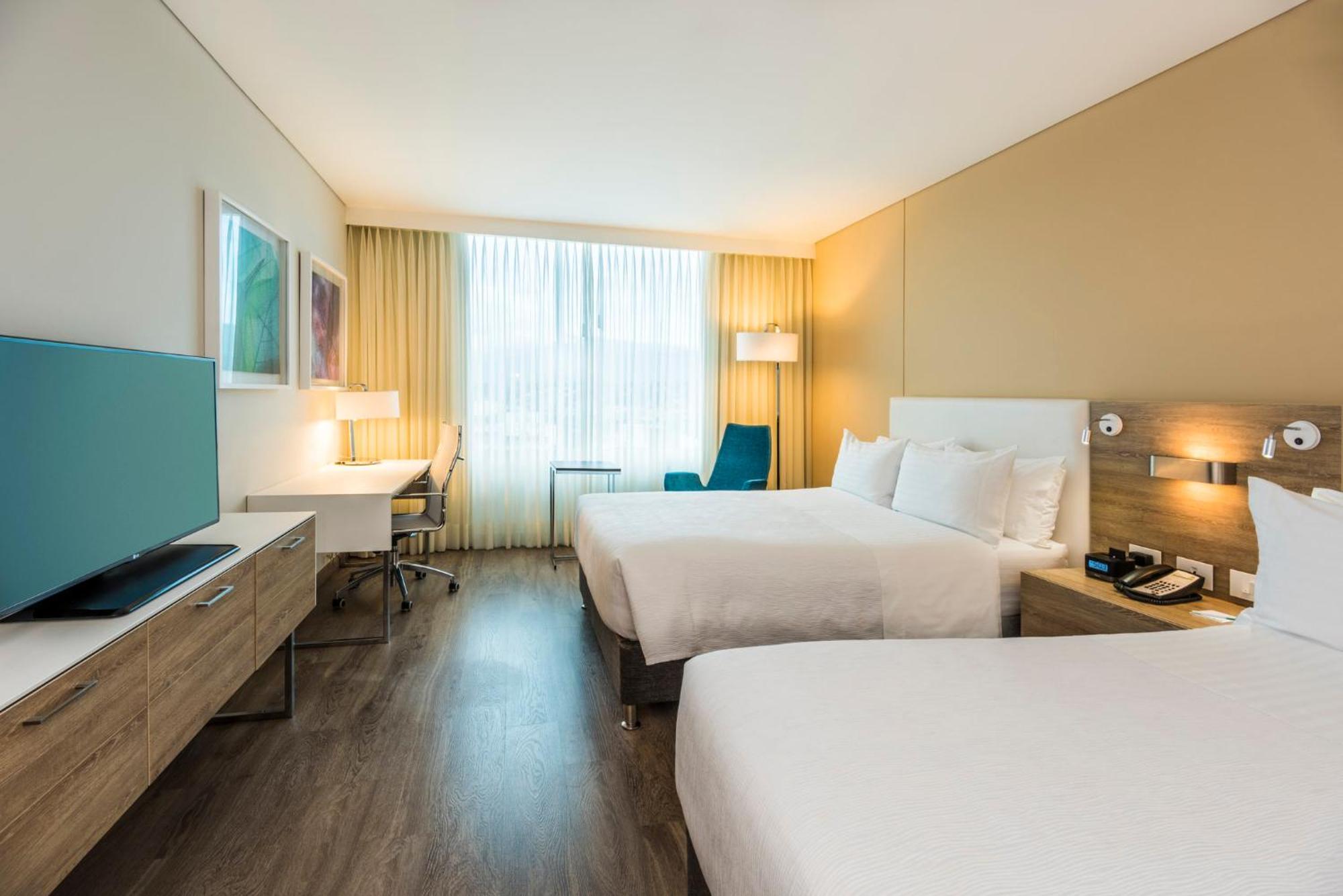 Holiday Inn Cúcuta, an IHG Hotel Bagian luar foto A typical room at the hotel